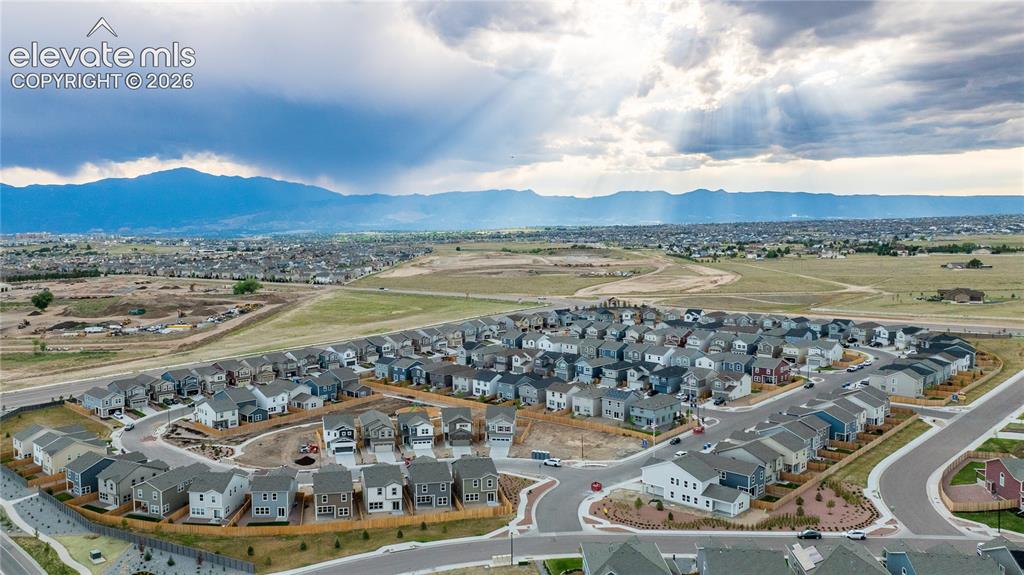 Image 44 of 45: Expansive aerial perspective showcasing a residential community with divers