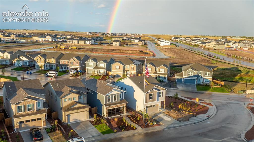 Image 45 of 45: Developed residential community featuring a variety of housing styles, pave