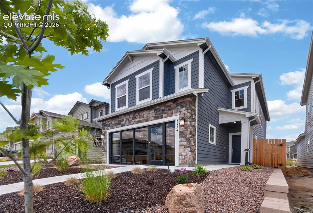 Image 5 of 45: Modern residential community featuring a variety of two-story homes with at