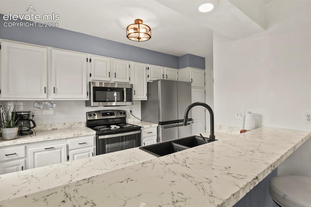 Image 10 of 38: Kitchen