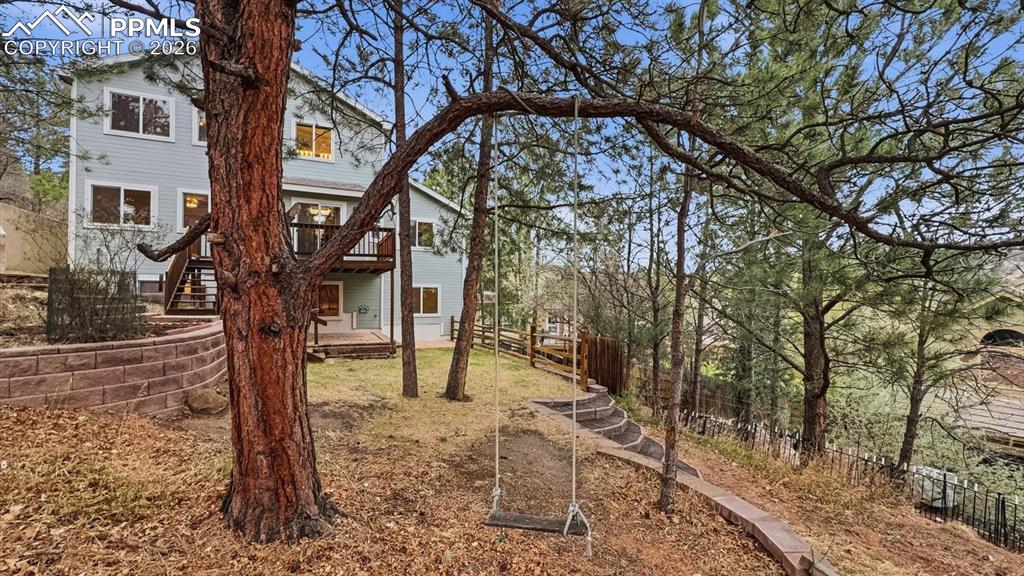 Image 11 of 47: The walkout basement expands the living space with a spacious rec room with