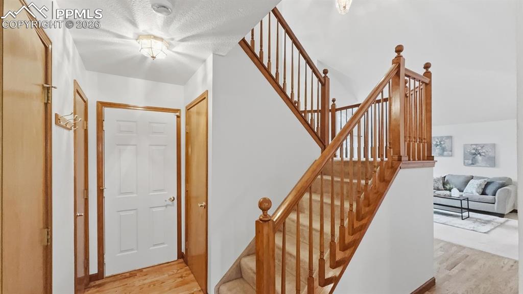 Image 13 of 47: Surrounded by mature trees & open space, this property offers exceptional p