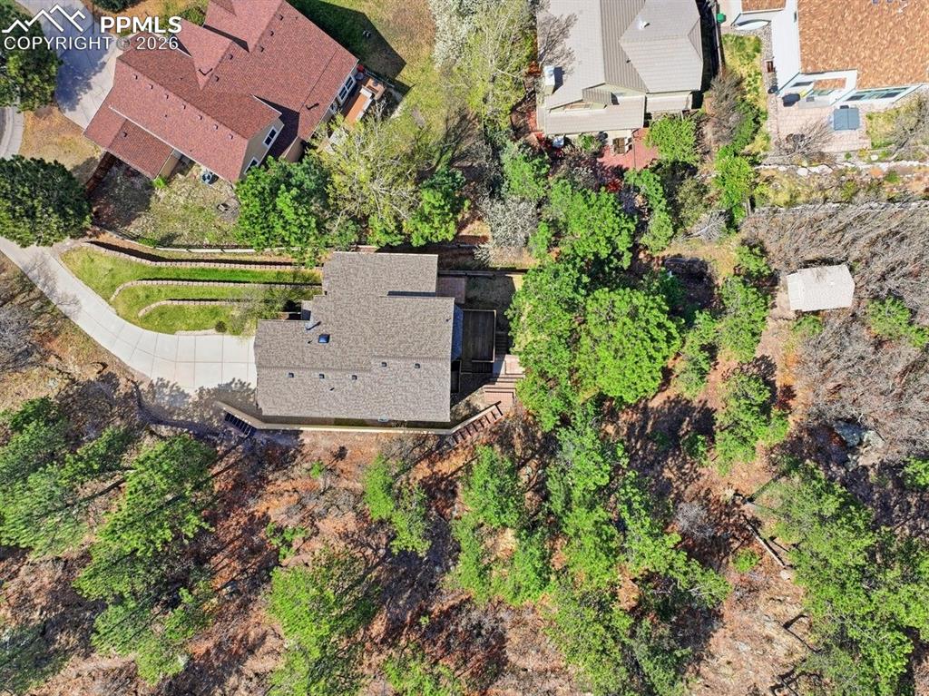 Image 47 of 47: Aerial rear view of home, lot, cul-de-sac, and mountain views