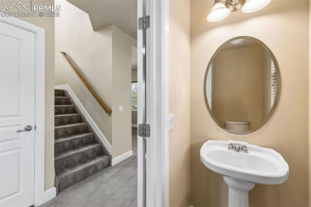 Image 13 of 27: Half bath on main level