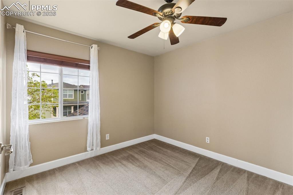 Image 20 of 27: Bedroom