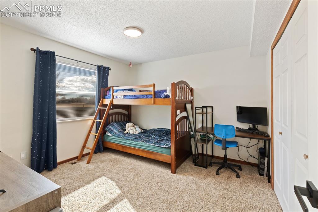 Image 18 of 31: Bedroom