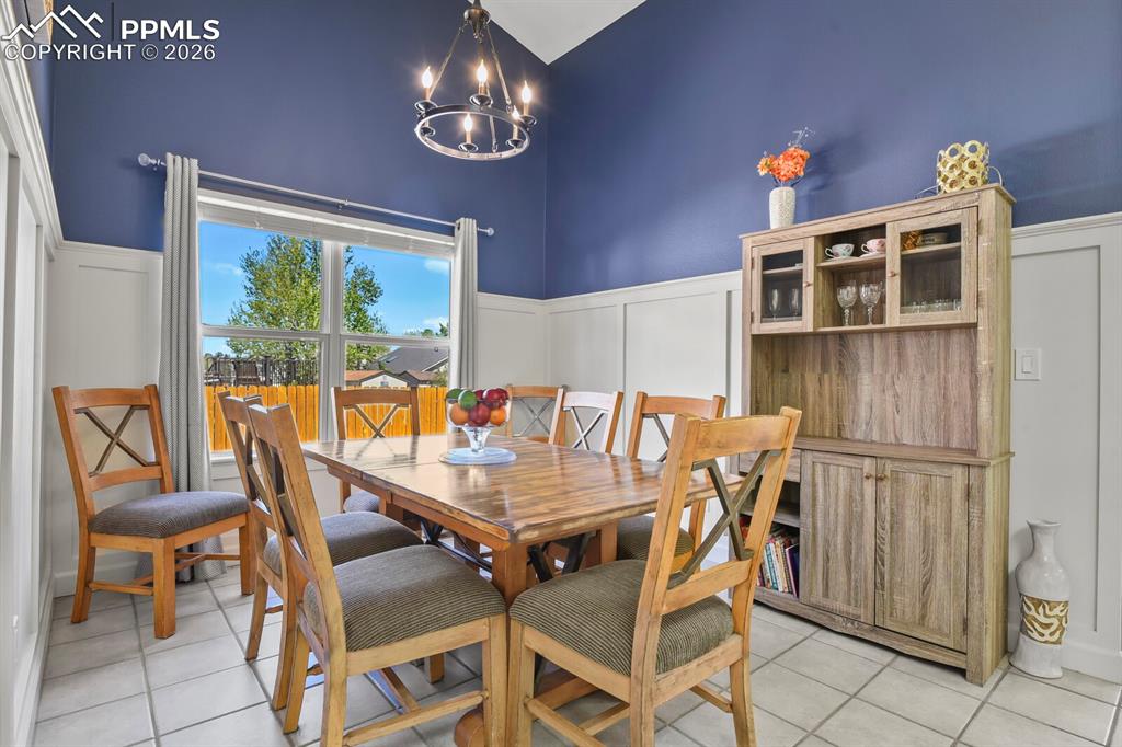 Image 11 of 34: Vaulted ceilings & wainscoting