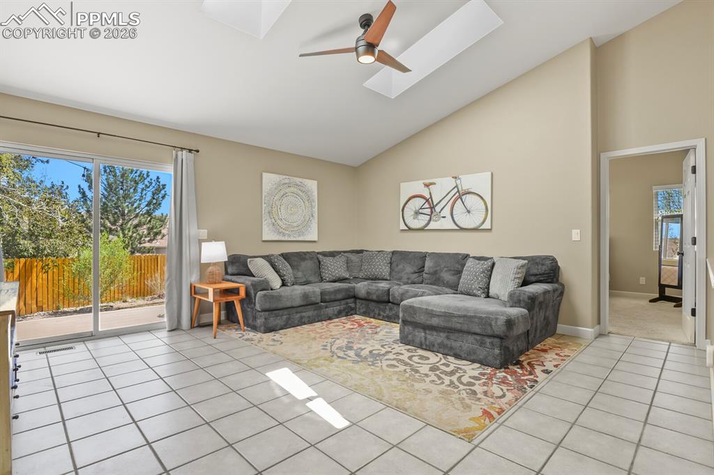 Image 13 of 34: Vaulted living room