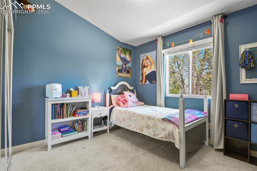 Image 19 of 34: 2nd main level bedroom or could be an office