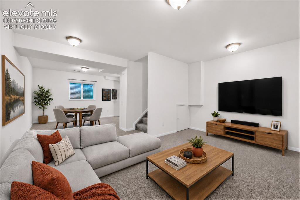 Image 37 of 50: Virtually Staged - Basement Family Room