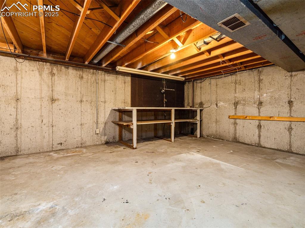 Image 19 of 28: View of unfinished below grade area