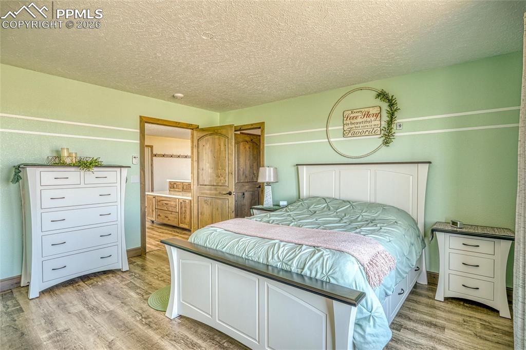 Image 22 of 50: Bedroom featuring a