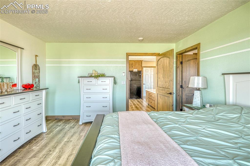 Image 23 of 50: Bedroom featuring a