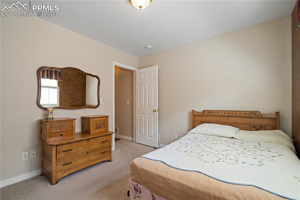 Image 27 of 49: View of carpeted bedroom