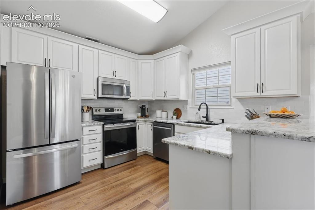 Image 6 of 39: Kitchen