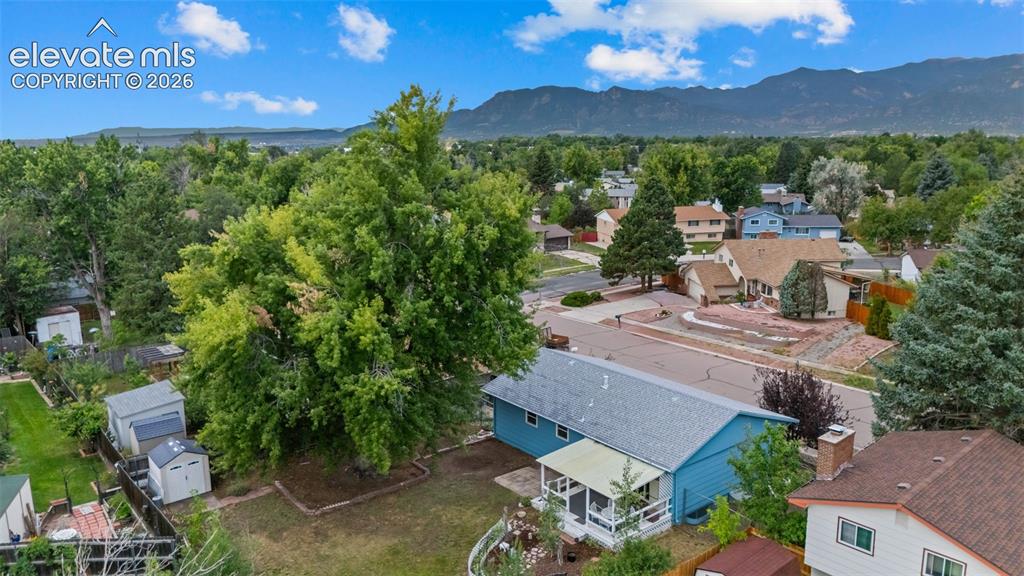 Image 28 of 35: Aerial view showcasing this residential property nestled on a spacious lot 
