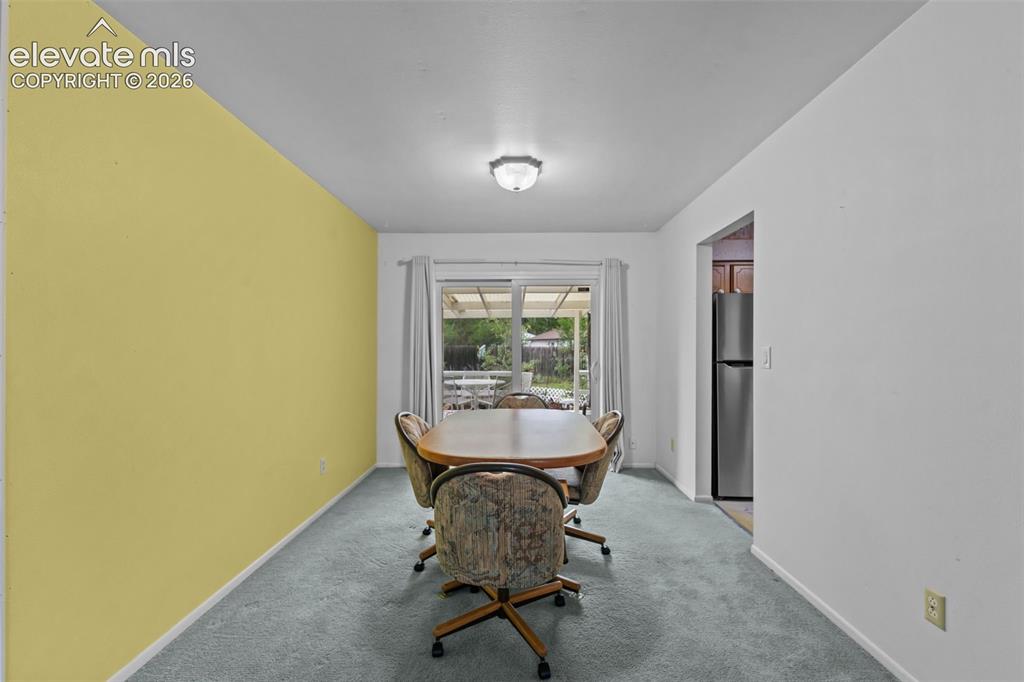 Image 9 of 35: Recessed ceiling light fixture, sliding glass door with exterior access, li