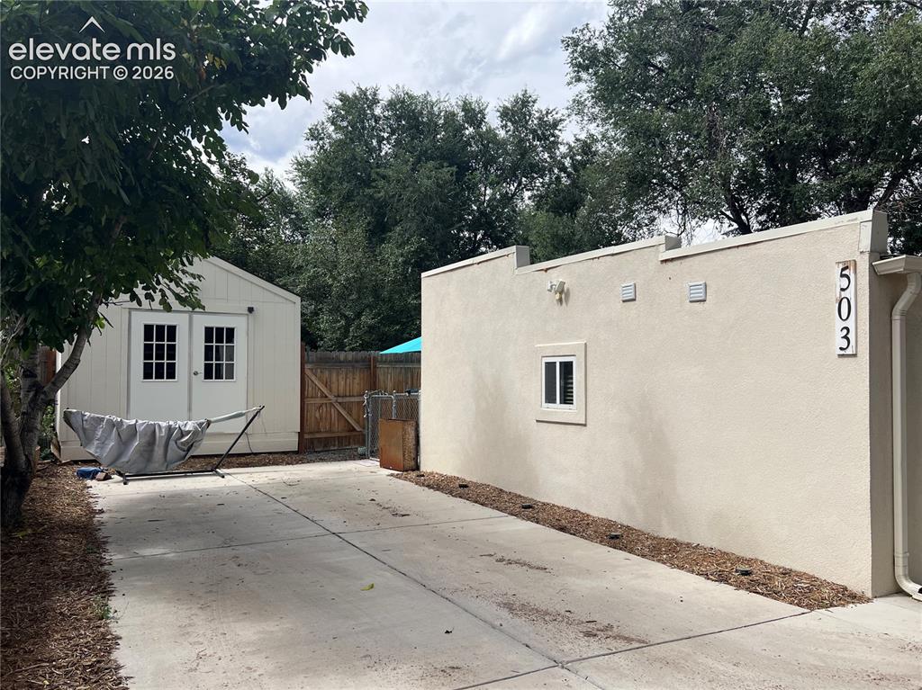 Image 32 of 33: ADU/Cottage with large storage shed/workshop and private parking space.
