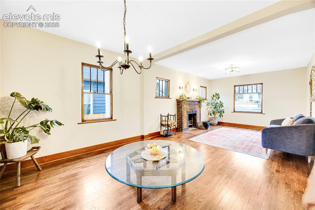 Image 5 of 33: Hardwood flooring, updated light fixtures
