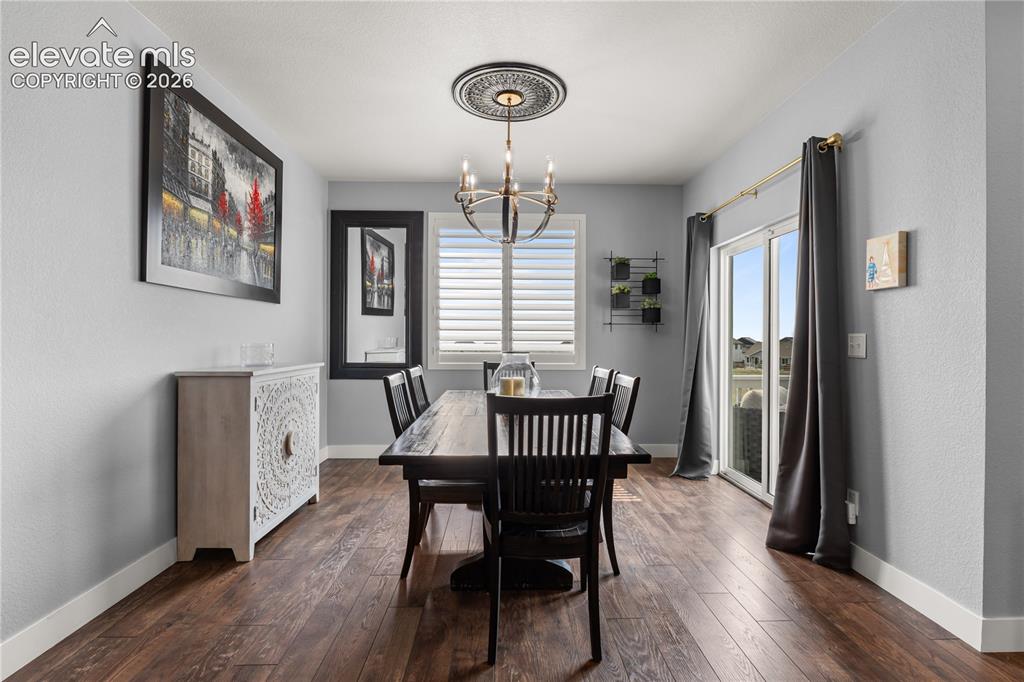 Image 14 of 41: The expansive dining space is perfect for evening dinners or entertaining.