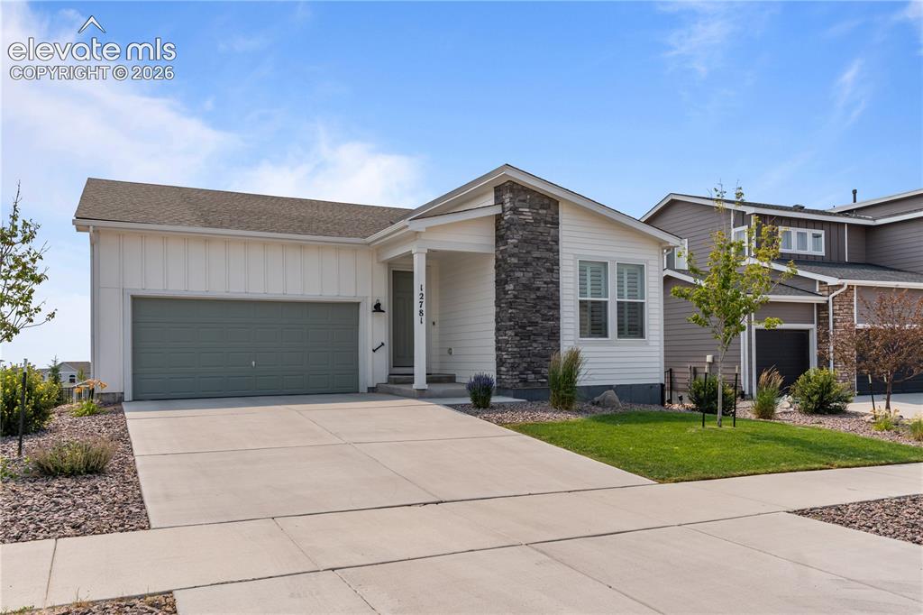 Image 2 of 41: Modern decor indoors and out, walkout basement, and an incredible lot!