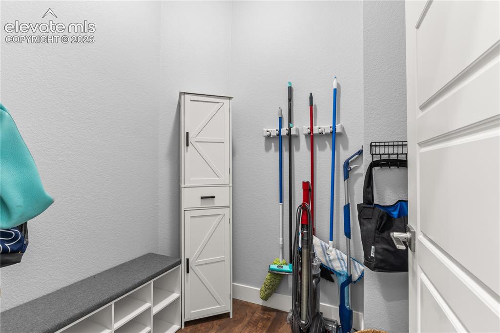 Image 22 of 41: The mudroom is perfectly located and has plenty of storage for your drop zo