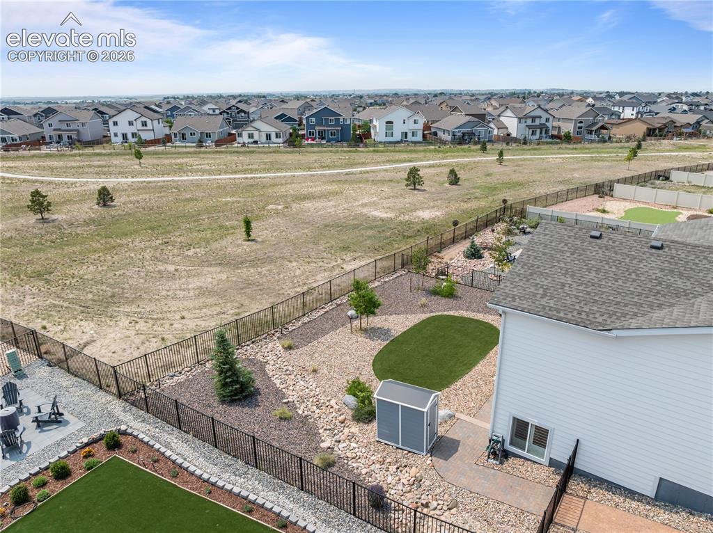 Image 3 of 41: Backing to open space, this meticulously landscaped lot is the PERFECT plac