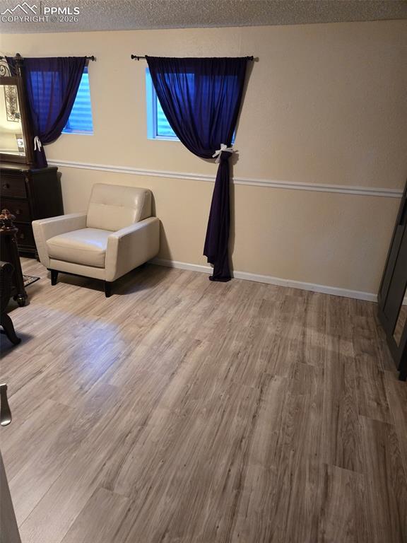 Image 12 of 15: Downstairs family room