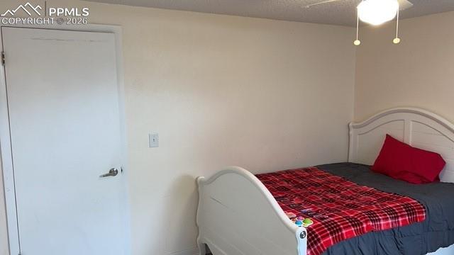 Image 23 of 33: Bedroom downstairs