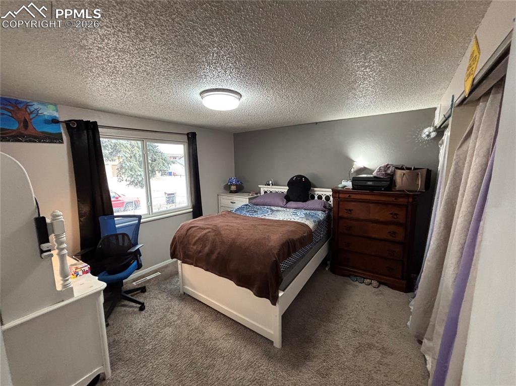 Image 4 of 15: Upstairs bedroom one 2nd angle 