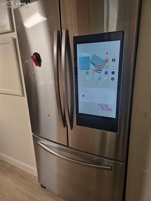 Image 9 of 35: smart refrigerator in kitchen