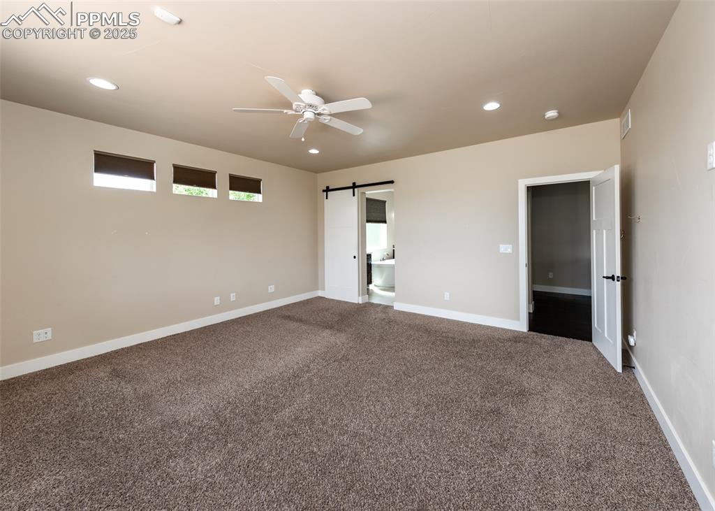 Image 19 of 40: Master Bedroom