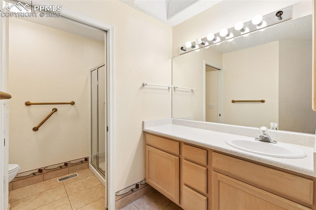 Image 11 of 16: Master Bathroom