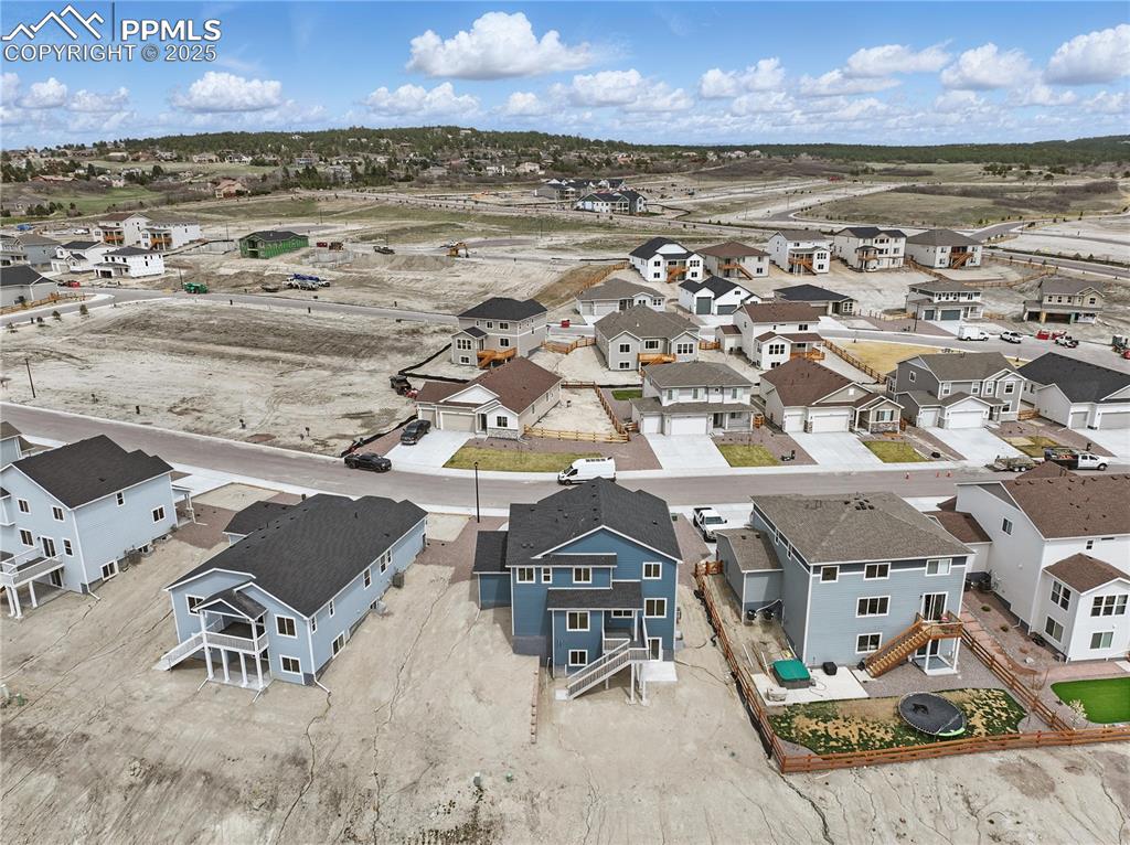 Image 5 of 36: Drone / aerial view featuring a residential view