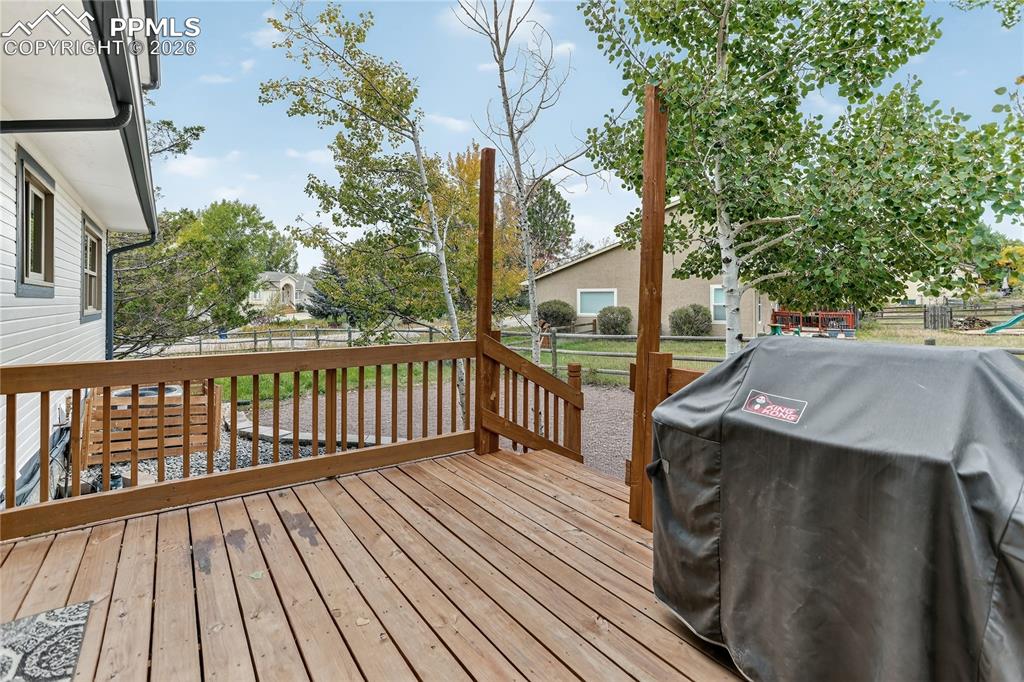 Image 27 of 32: Back deck for outdoor entertainment