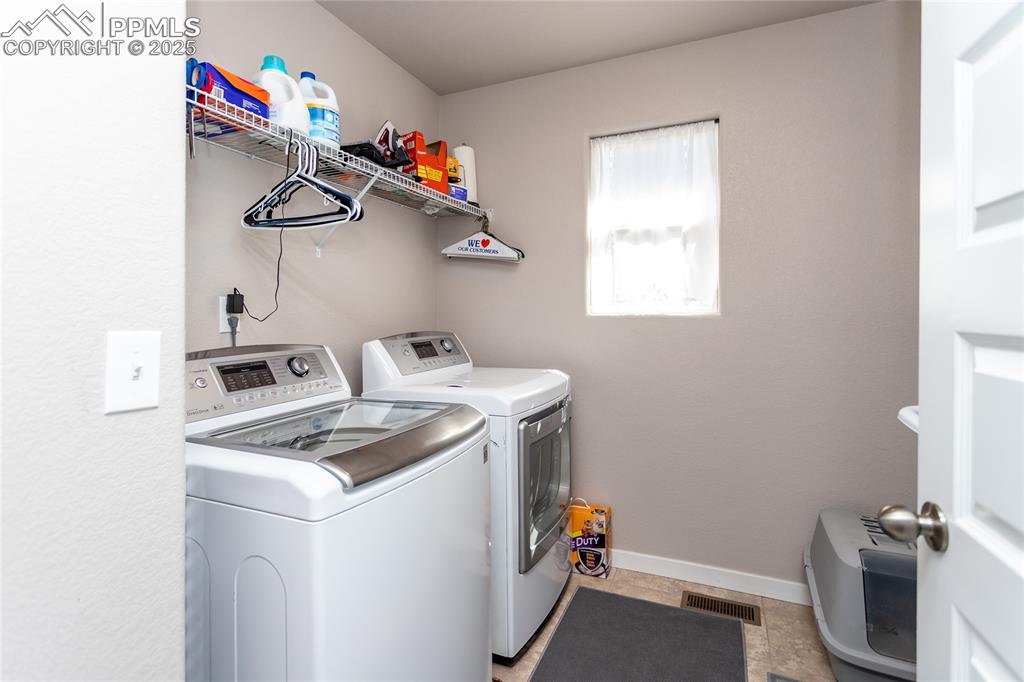 Image 17 of 29: Laundry room upstairs
