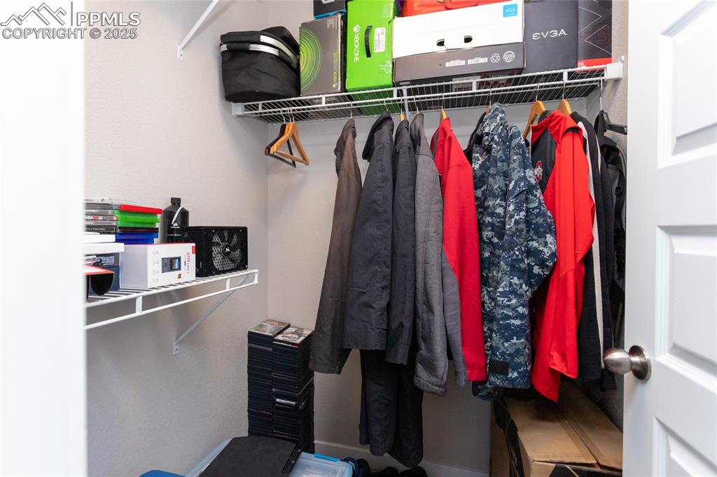 Image 19 of 29: Walk-in closets in secondary bedrooms