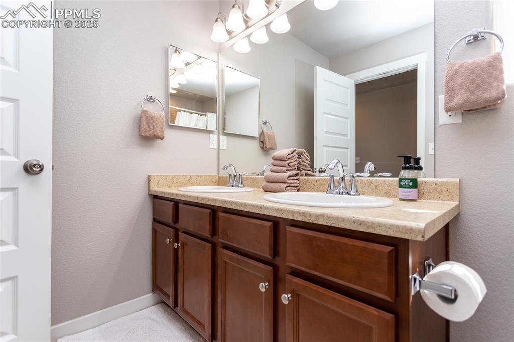 Image 20 of 29: Hall bathroom