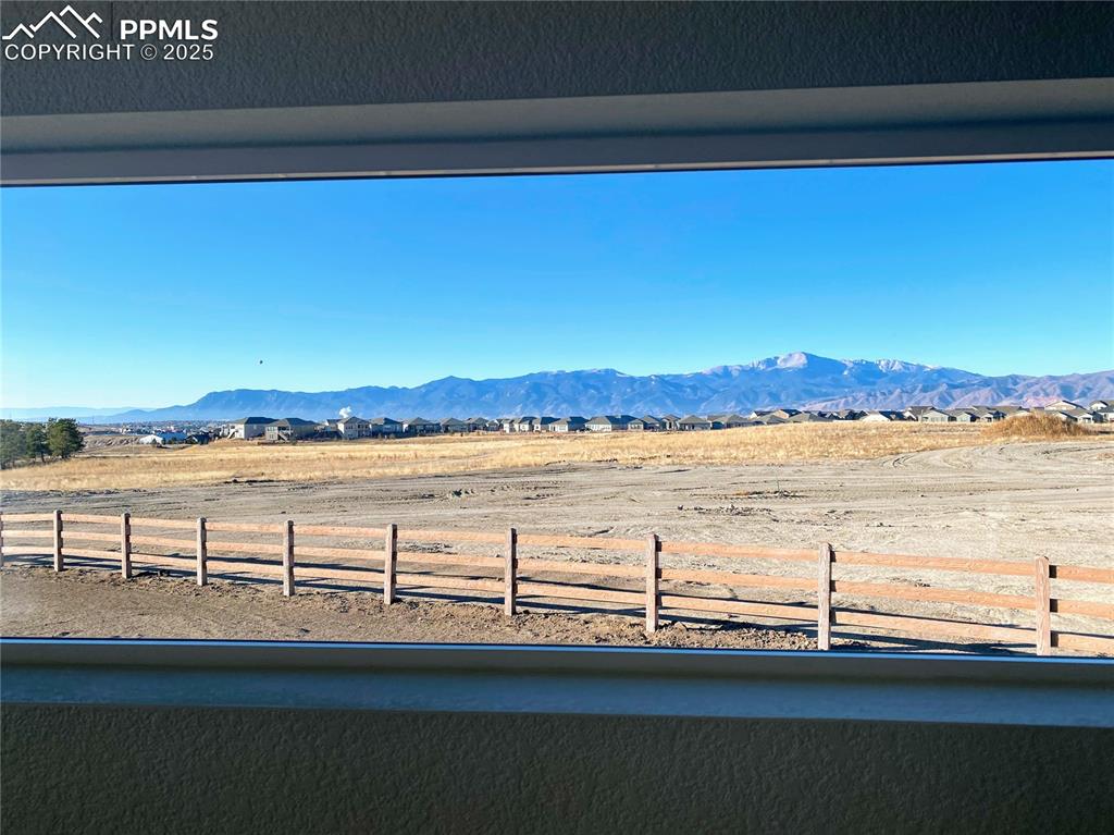 Image 13 of 31: View of mountain backdrop featuring rural landscape