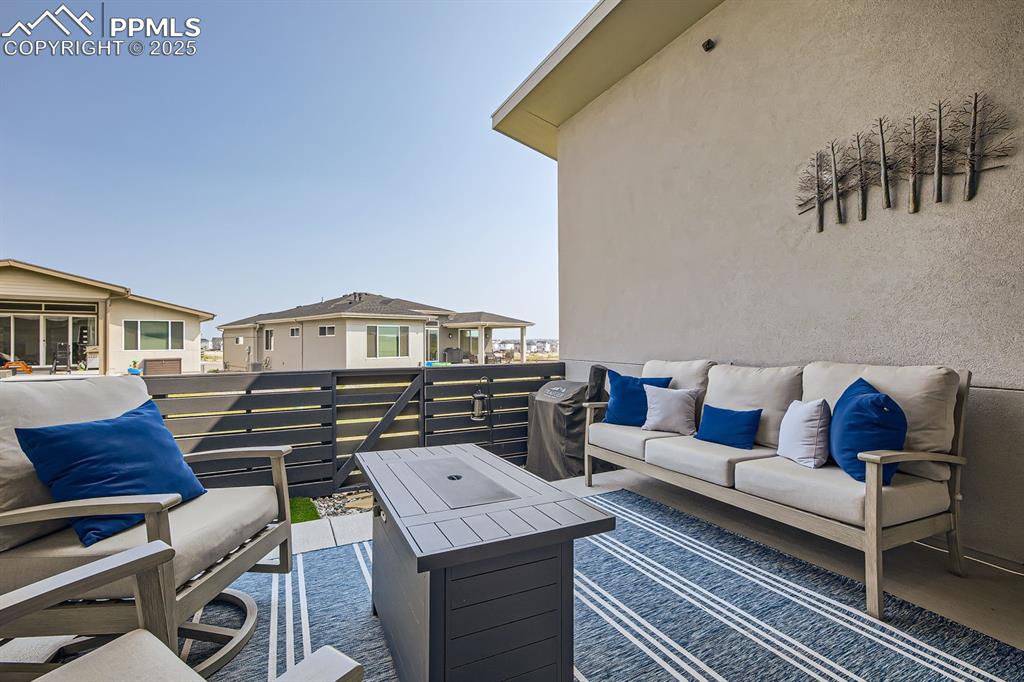 Image 29 of 31: View of patio / terrace with an outdoor living space