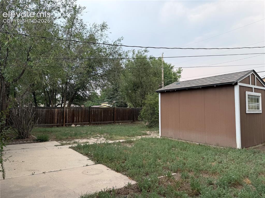 Image 15 of 16: Back yard and shed