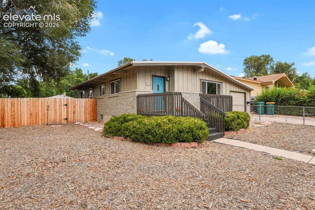 Image 1 of 37: Front of house from north-west corner of the yard.