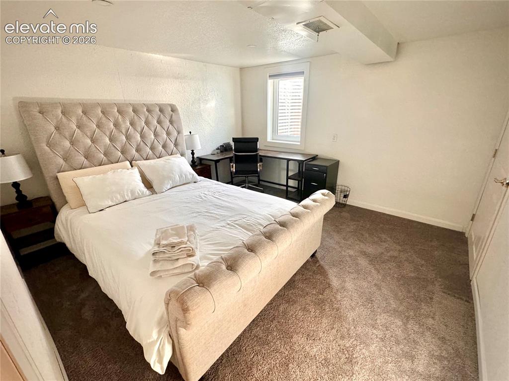 Image 14 of 30: Bedroom with office space, basement 12