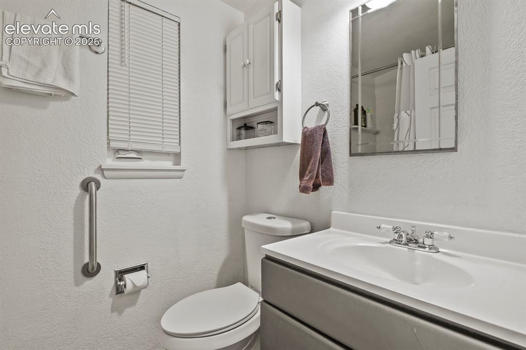 Image 17 of 37: Second bedroom, main floor.