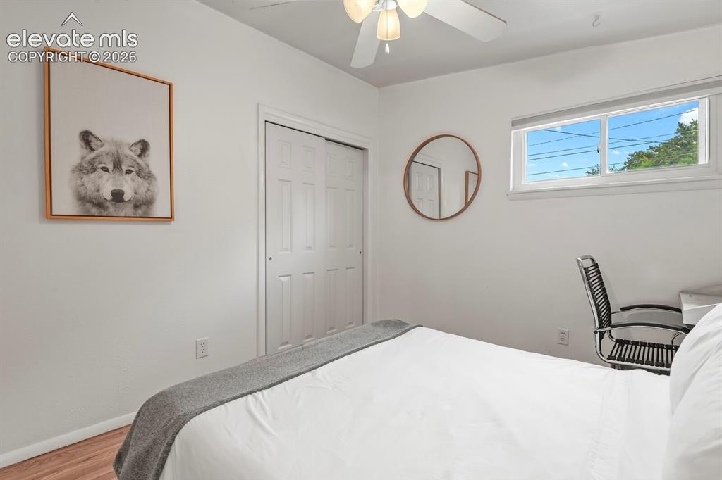Image 19 of 37: Small office area looking toward hallway and second, main-floor bedroom.