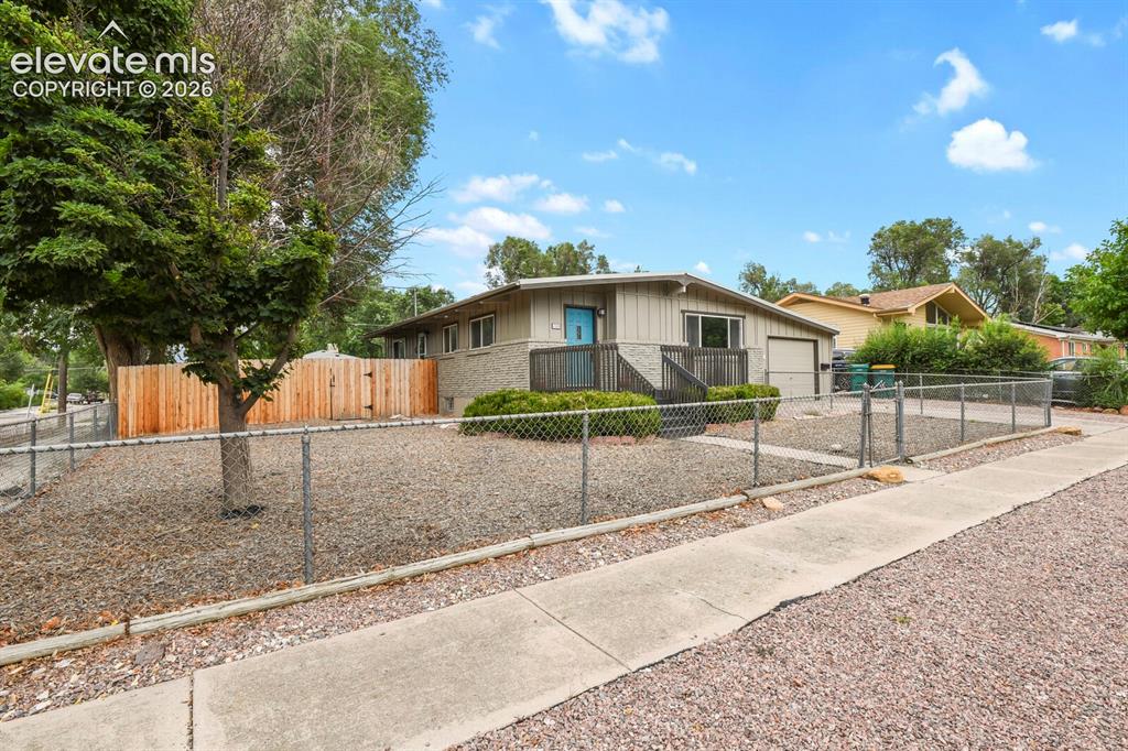 Image 2 of 37: Front yard and entrance.