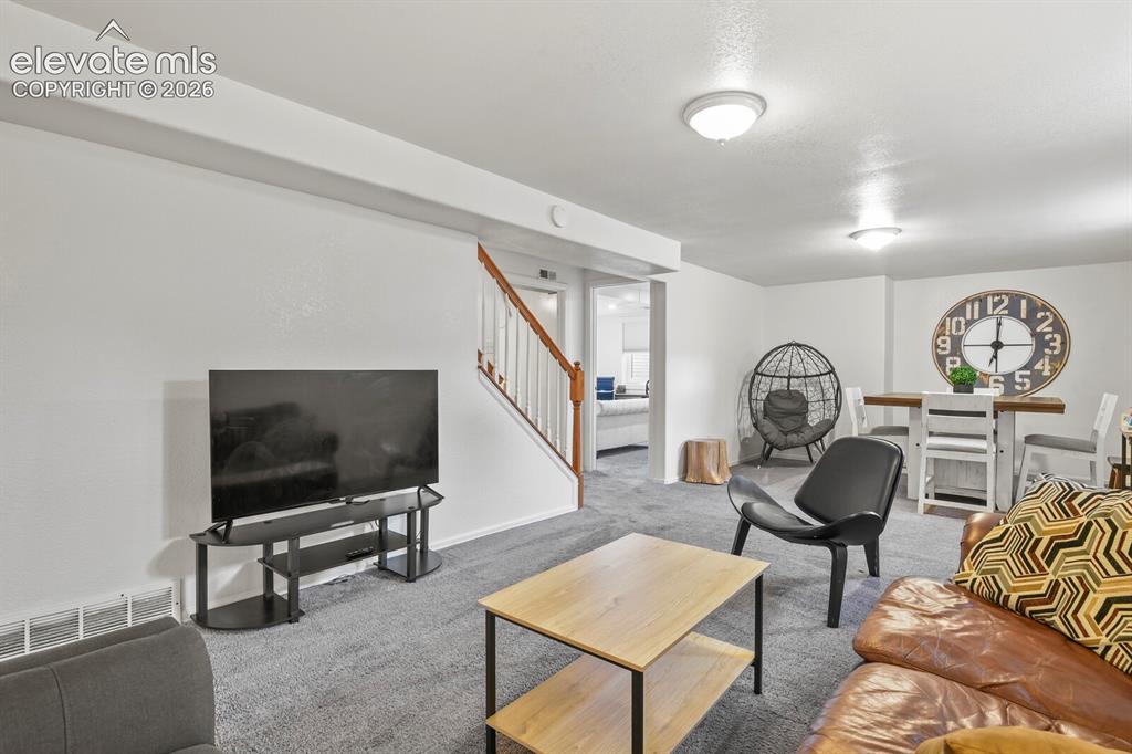 Image 23 of 37: Dining area, card/game table in Family Room.