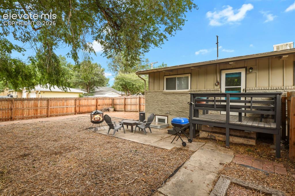 Image 35 of 37: Far corner of the property showing room for RV parking.