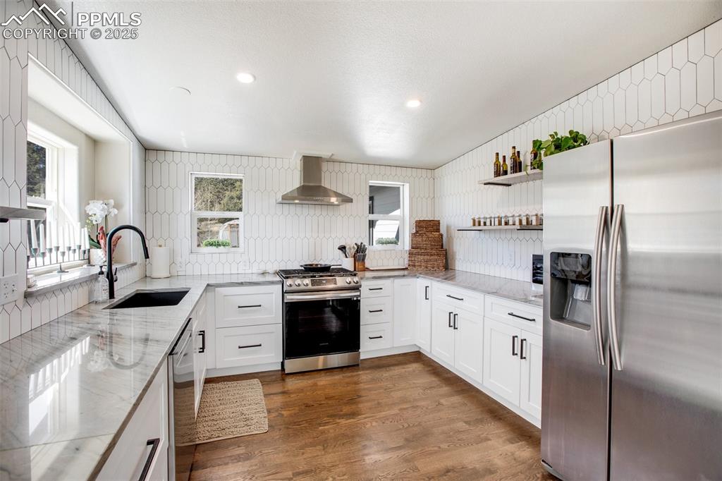 Image 13 of 50: Gorgeous remodeled kitchen