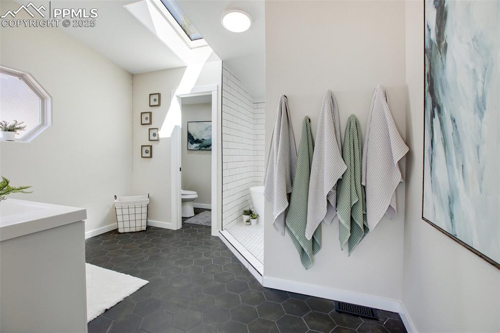 Image 18 of 50: Primary ensuite spa bathroom